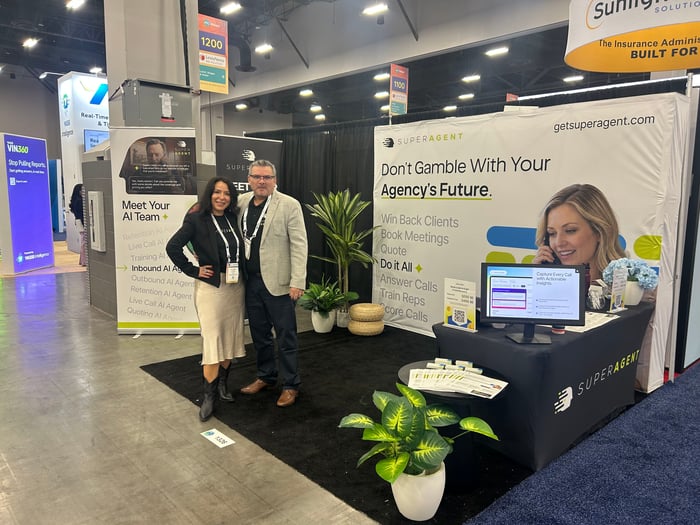 Visitors at the SUPERAGENT booth on the ITC Vegas 2026 expo floor