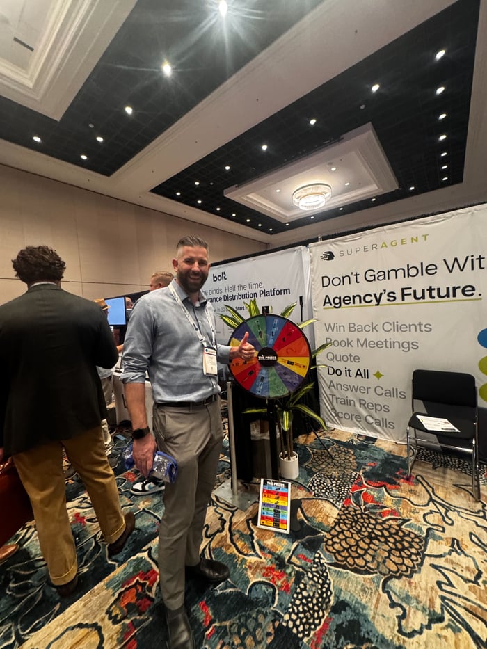 The SUPERAGENT booth busy with attendees at ITC Vegas 2026