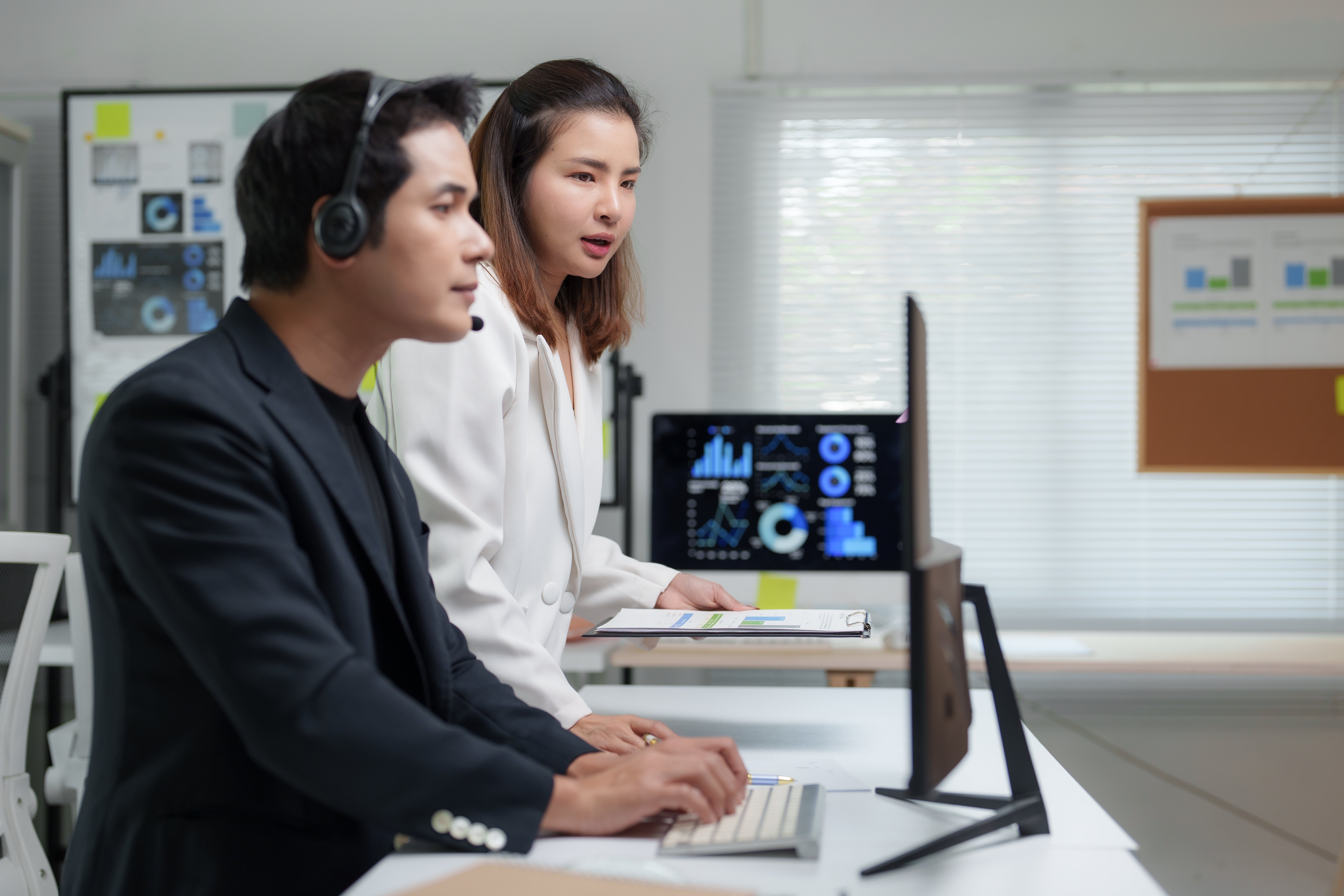 businesspeople-working-together-using-headset-and-2025-07-06-19-31-19-utc