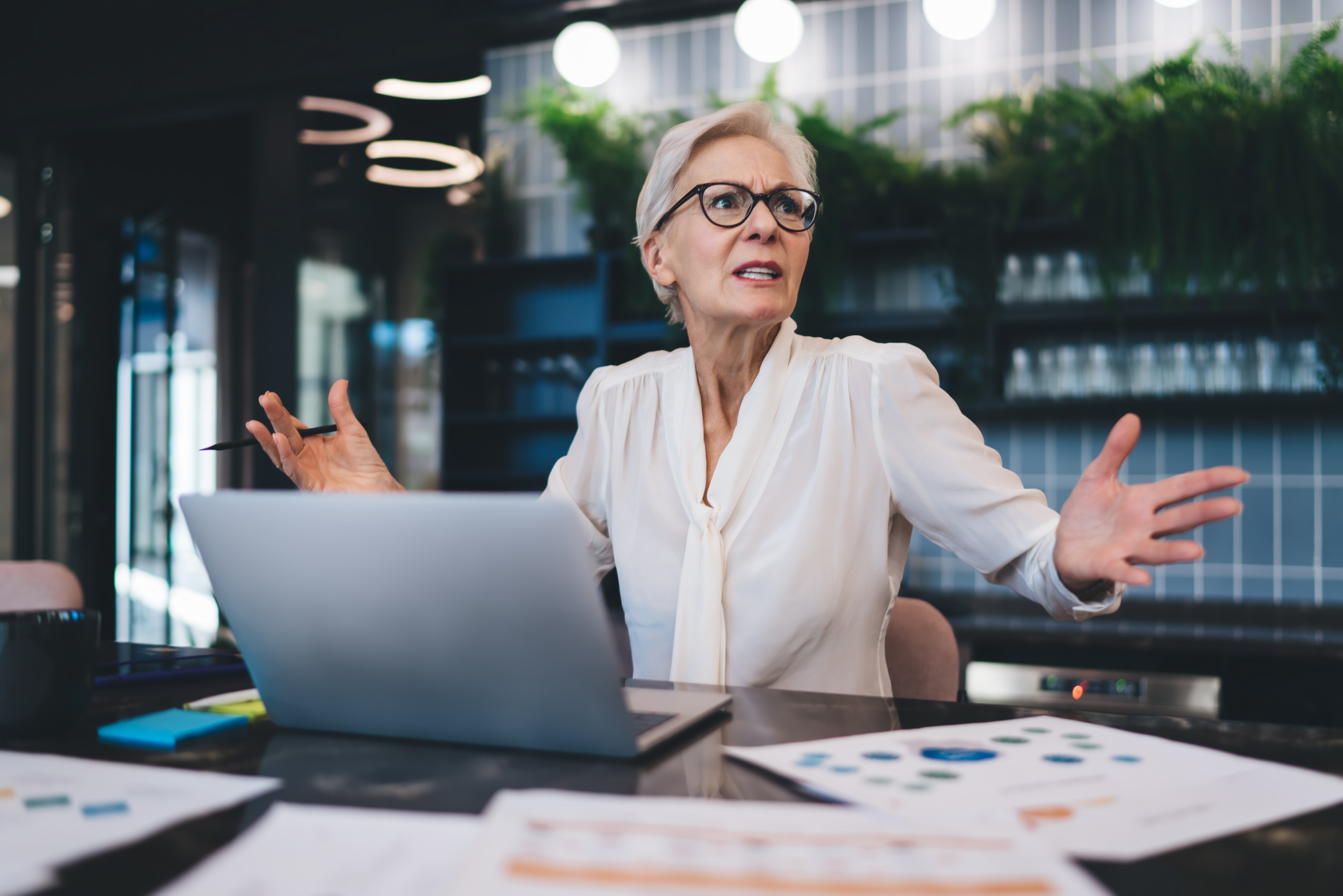 mad-businesswoman-working-remotely-having-video-co-2025-03-26-02-58-33-utc