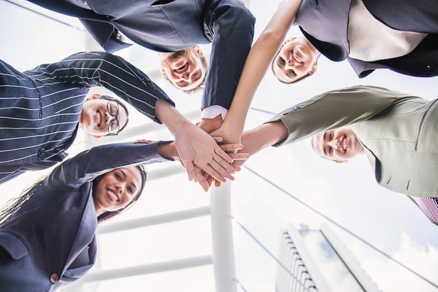 underneath-view-of-multicultural-business-people-m-2025-10-05-07-36-23-utc